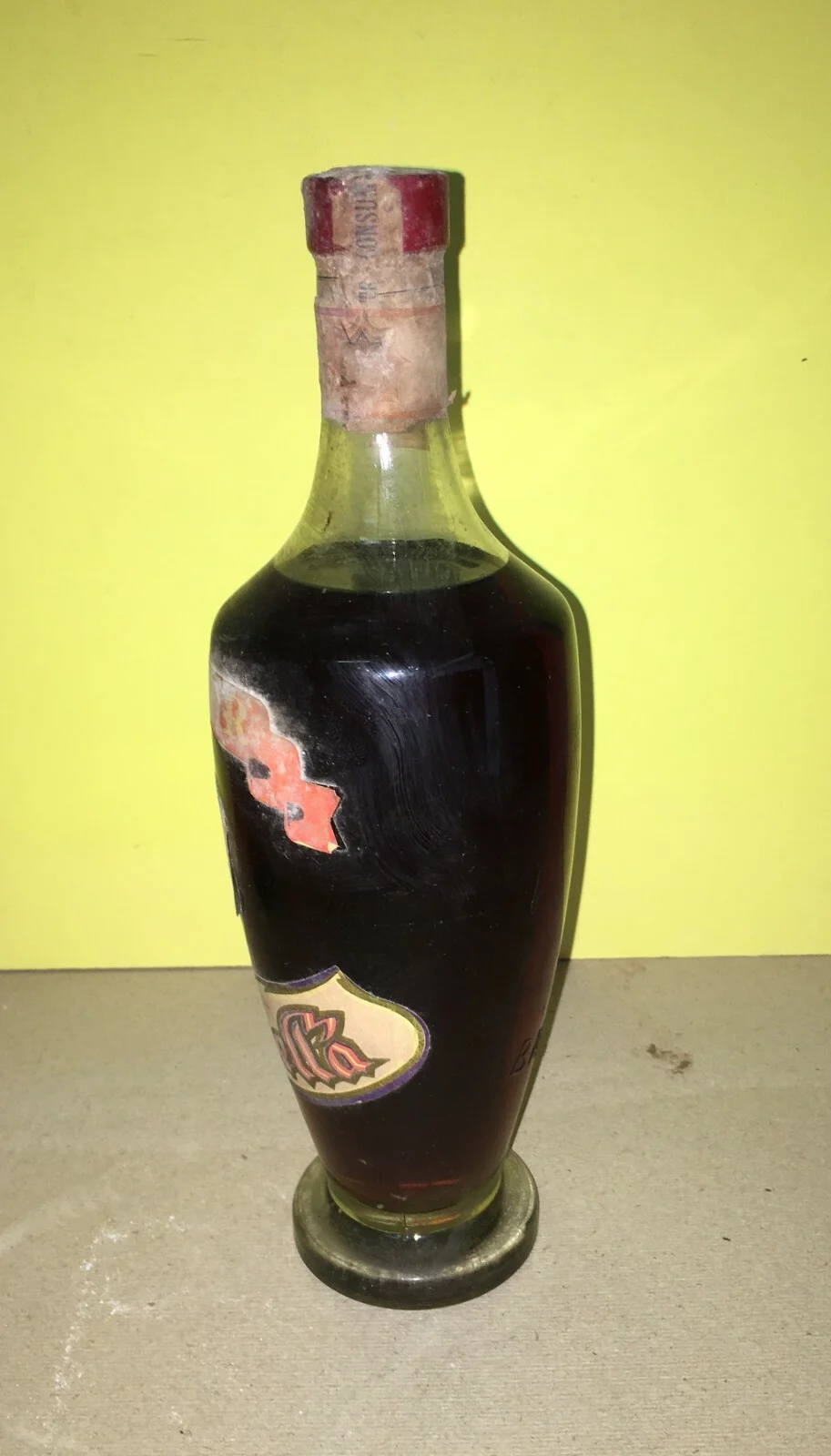 Wine, Enology and Liqueurs in Trieste: Baker Prunella Advertising Bottle