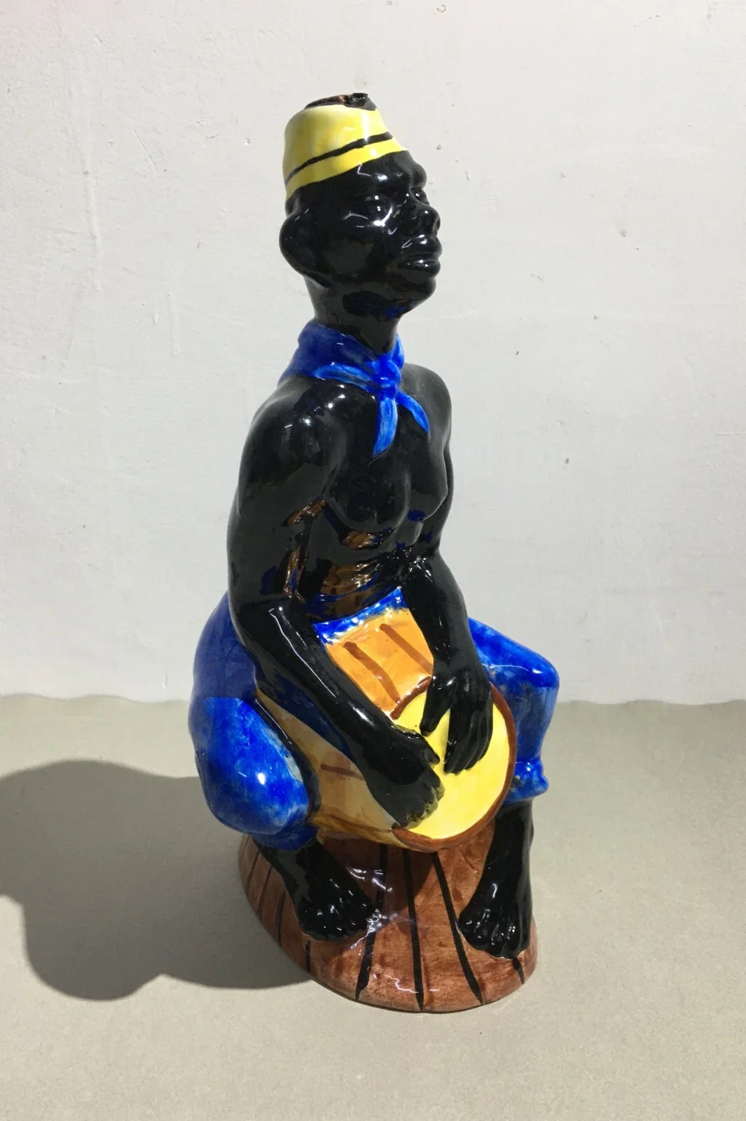 Liquor Distillery: Ceramic Bottle with Black Man, Elixir De Noix, Mid-1900s