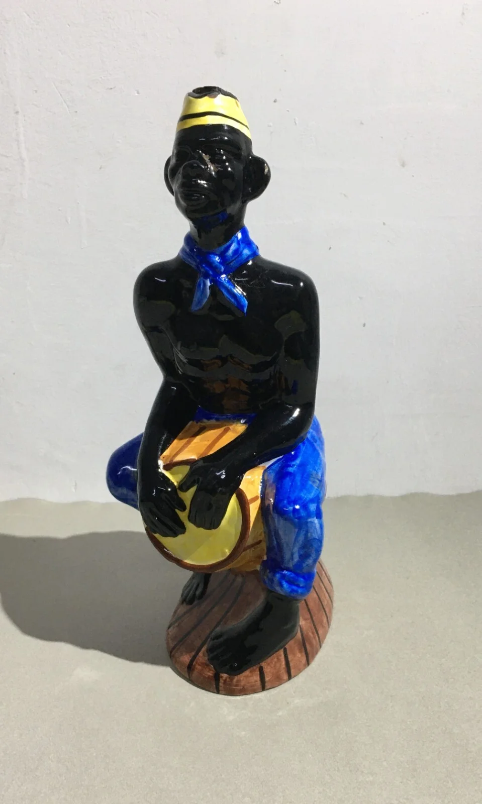 Liquor Distillery: Ceramic Bottle with Black Man, Elixir De Noix, Mid-1900s