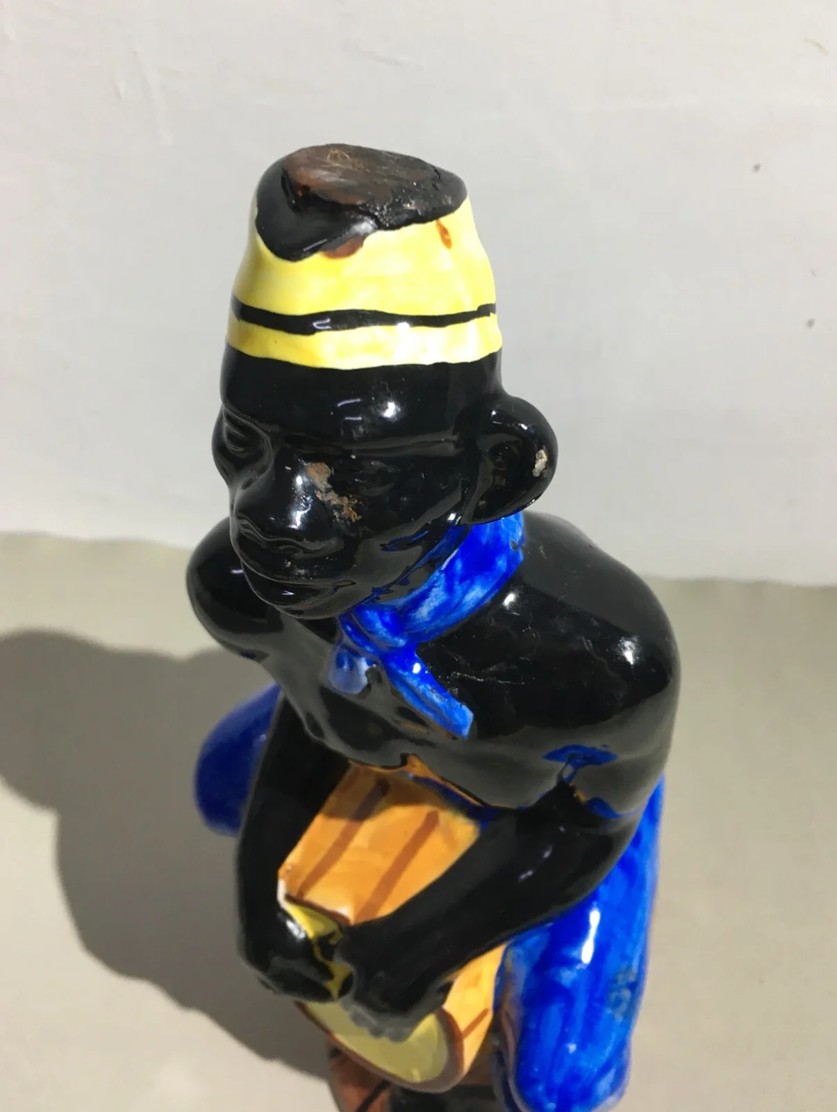 Liquor Distillery: Ceramic Bottle with Black Man, Elixir De Noix, Mid-1900s