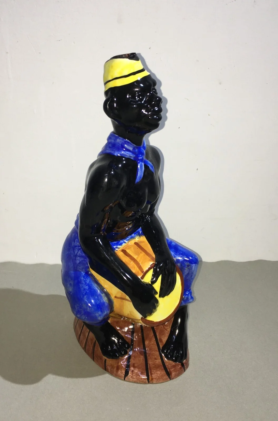 Liquor Distillery: Ceramic Bottle with Black Man, Elixir De Noix, Mid-1900s