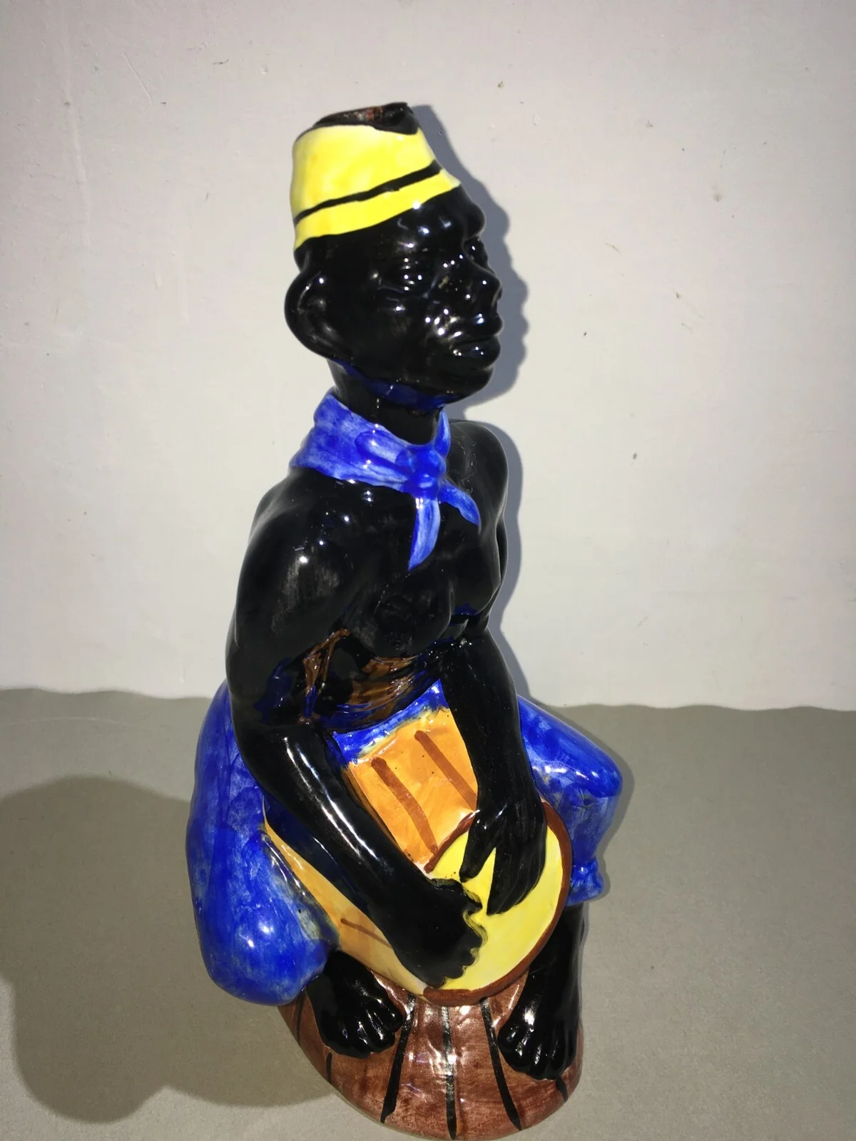 Liquor Distillery: Ceramic Bottle with Black Man, Elixir De Noix, Mid-1900s