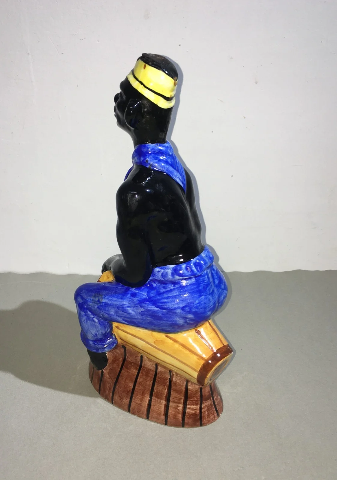 Liquor Distillery: Ceramic Bottle with Black Man, Elixir De Noix, Mid-1900s