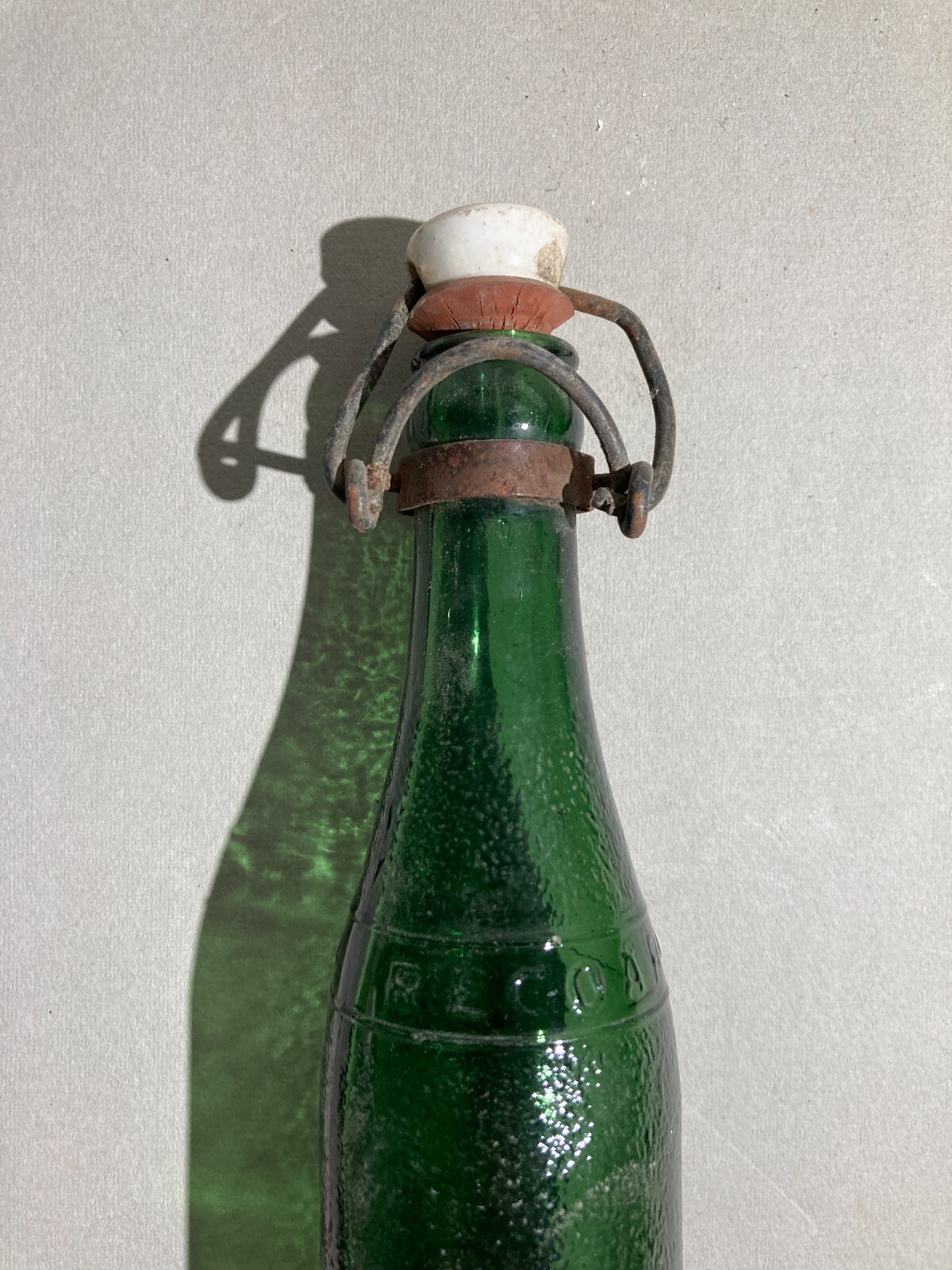 Bottiglia Da Collezione In Vetro Verde Pubblicitaria Recoaro Con Tappo In Porcellana