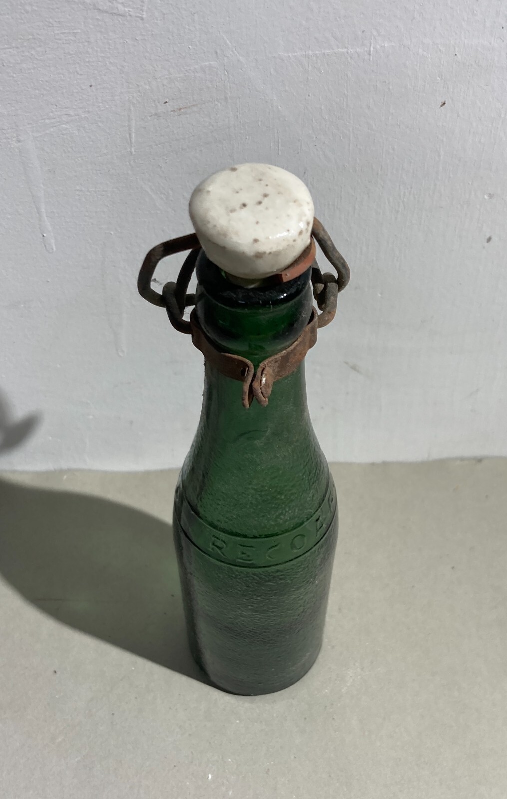 Bottiglia Da Collezione In Vetro Verde Pubblicitaria Recoaro Con Tappo In Porcellana