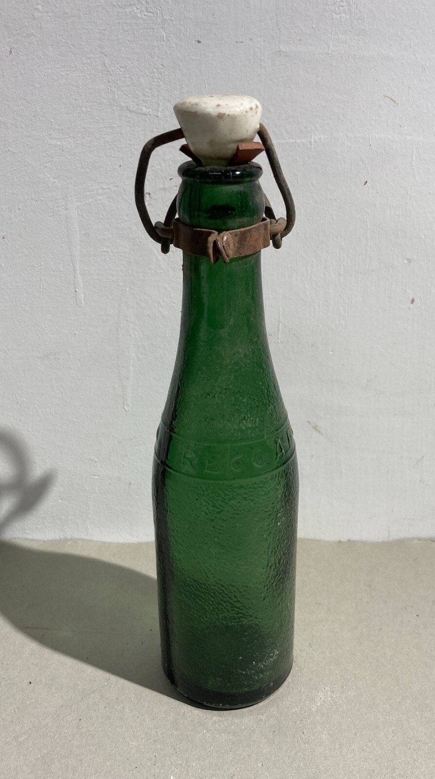 Bottiglia Da Collezione In Vetro Verde Pubblicitaria Recoaro Con Tappo In Porcellana