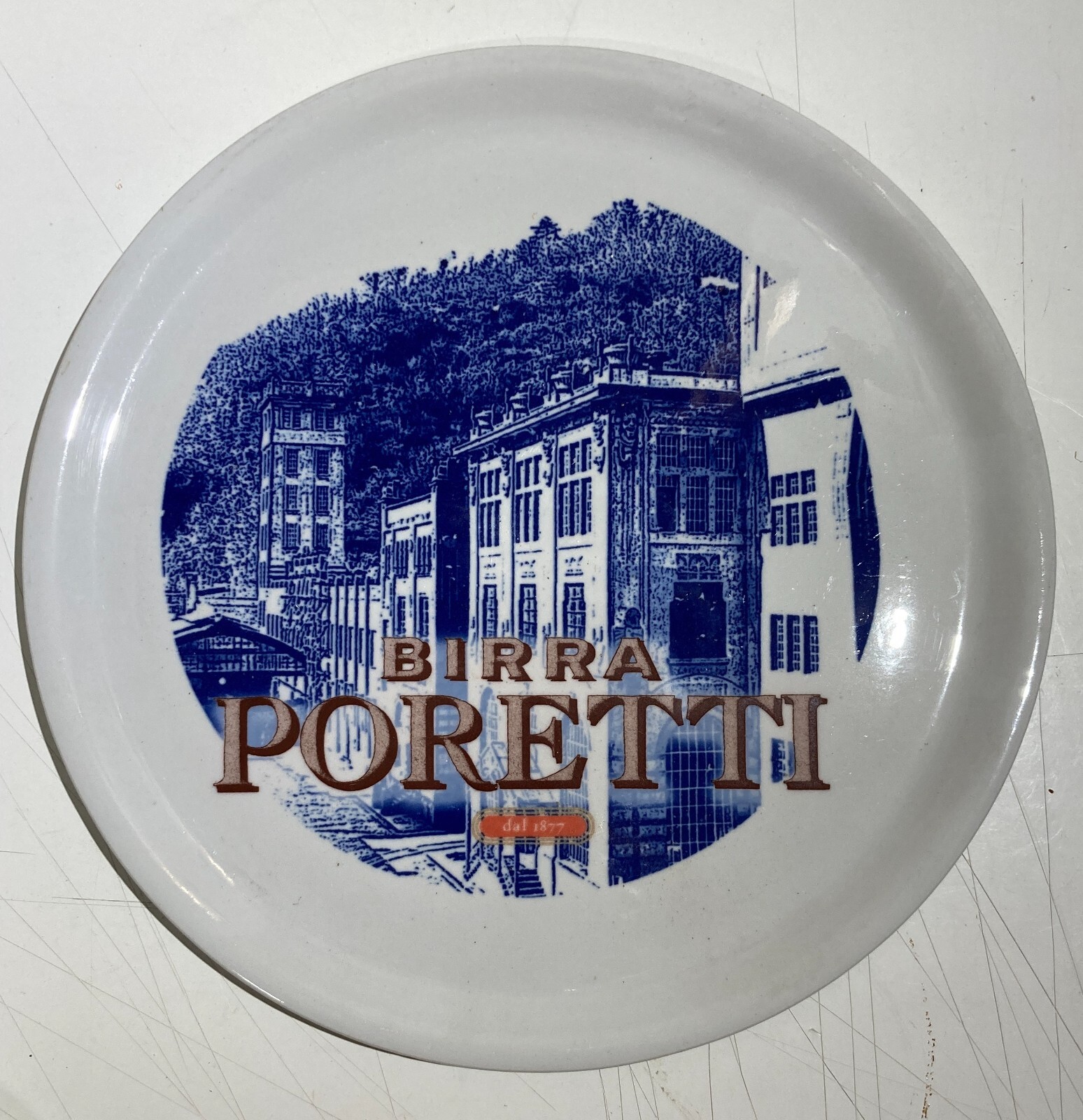 Piatto Decorativo Pubblicitario Birra Poretti In Ceramica Saturnia