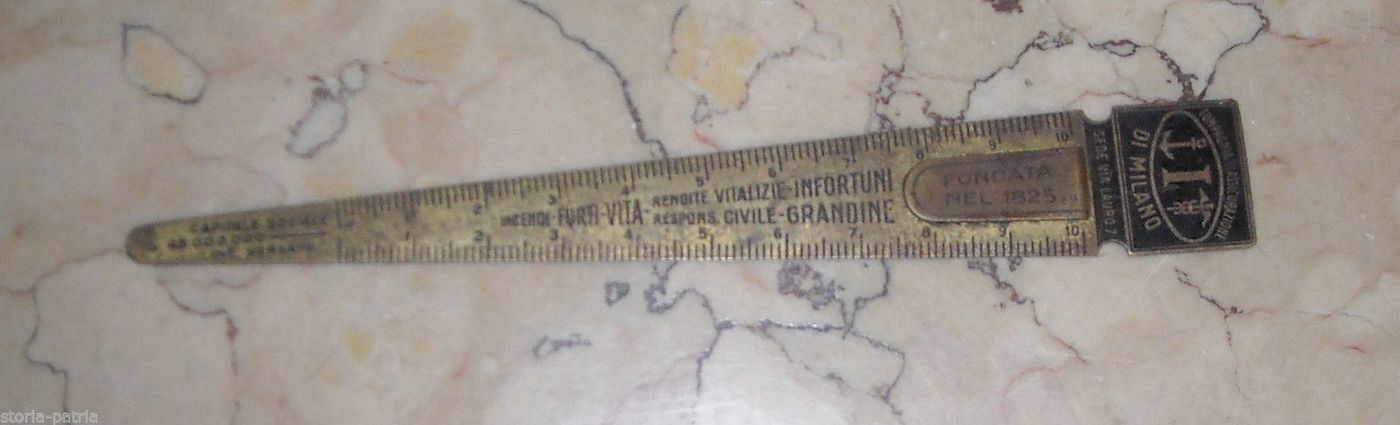 Pubblicità Compagnia d'Assicurazione Di Milano Sfogliacarte In Ottone, Anni '30