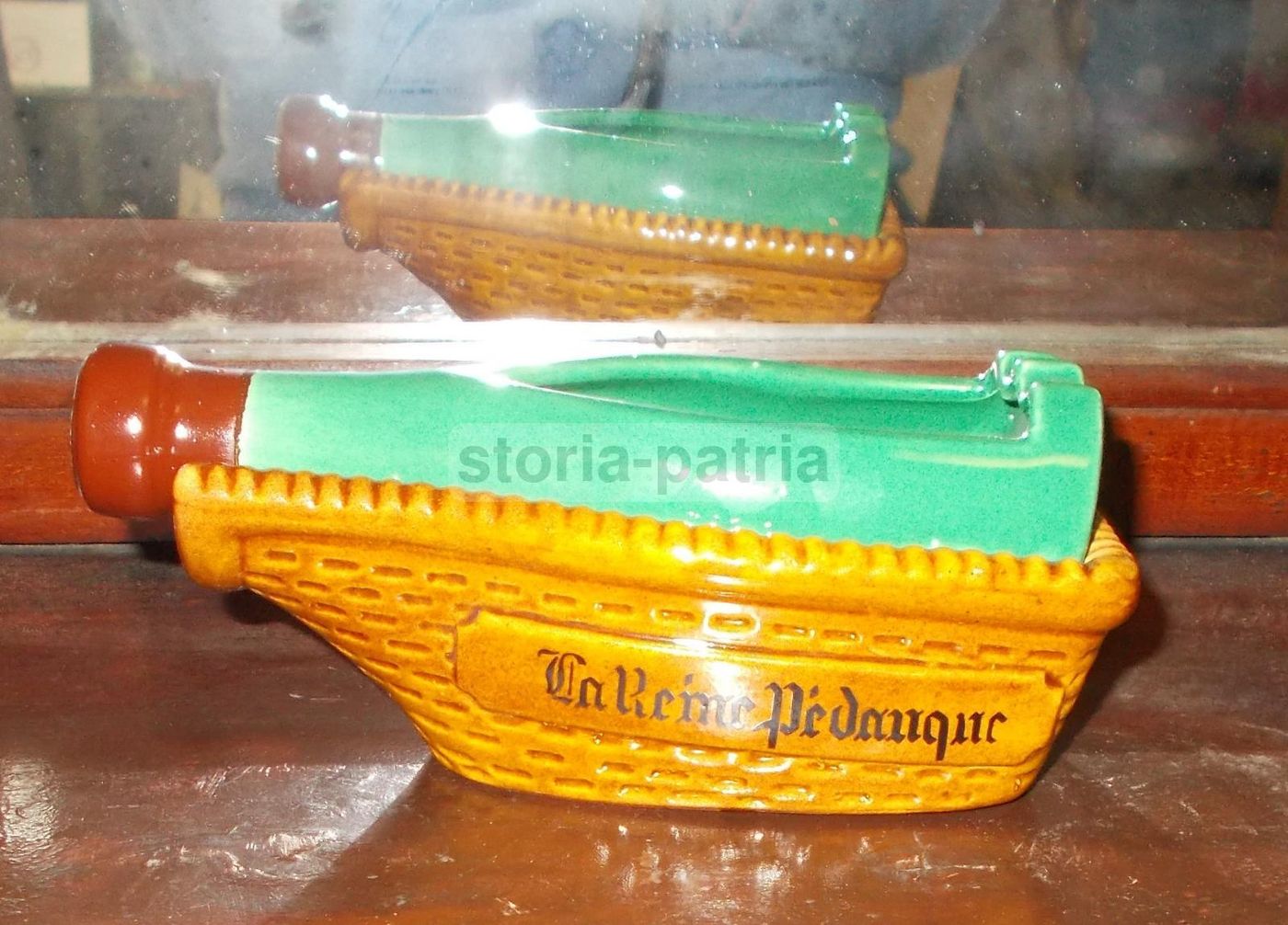 Supporto Bottiglia Pubblicitario La Reine Pedanque In Ceramica Marmaca